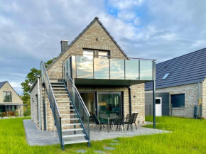 Ferienhaus Panoramadeck am Harkebrügger See mit Sauna und Kamin